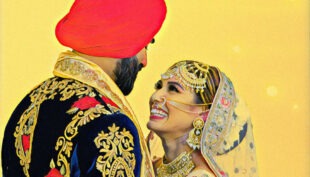 A Sikh Wedding Groom and Bride standing as a couple