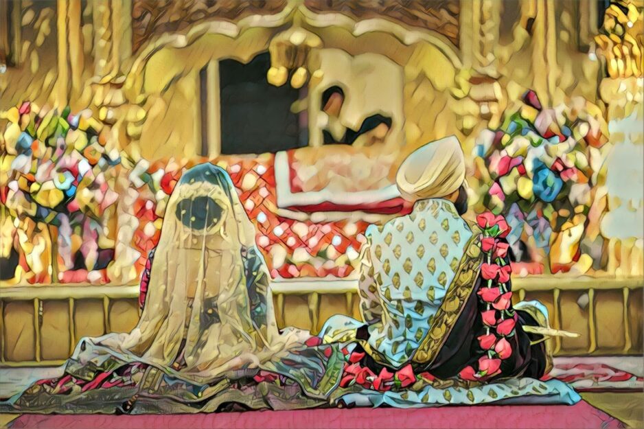 Sikh Couple sitting at a Gurdwara